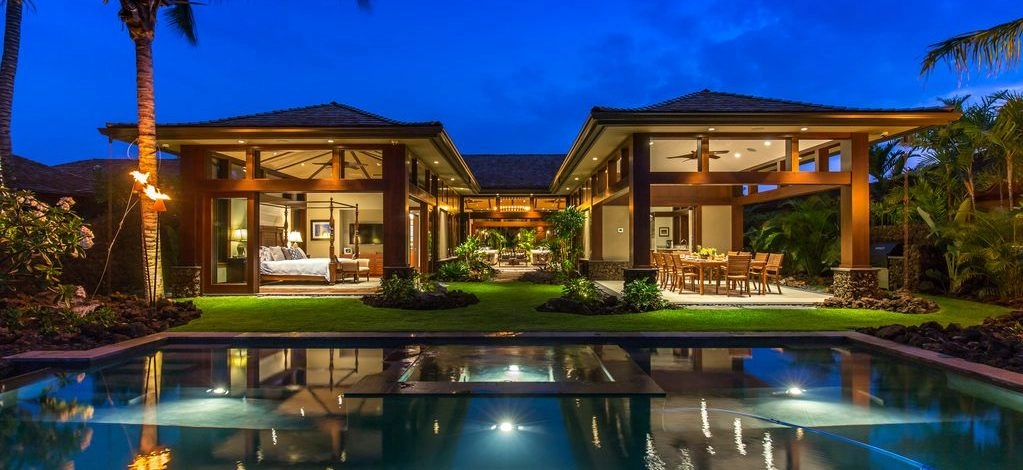 Hualalai 72-121 - Stunning Pool and back of home at dusk - Hawaii Vacation Home