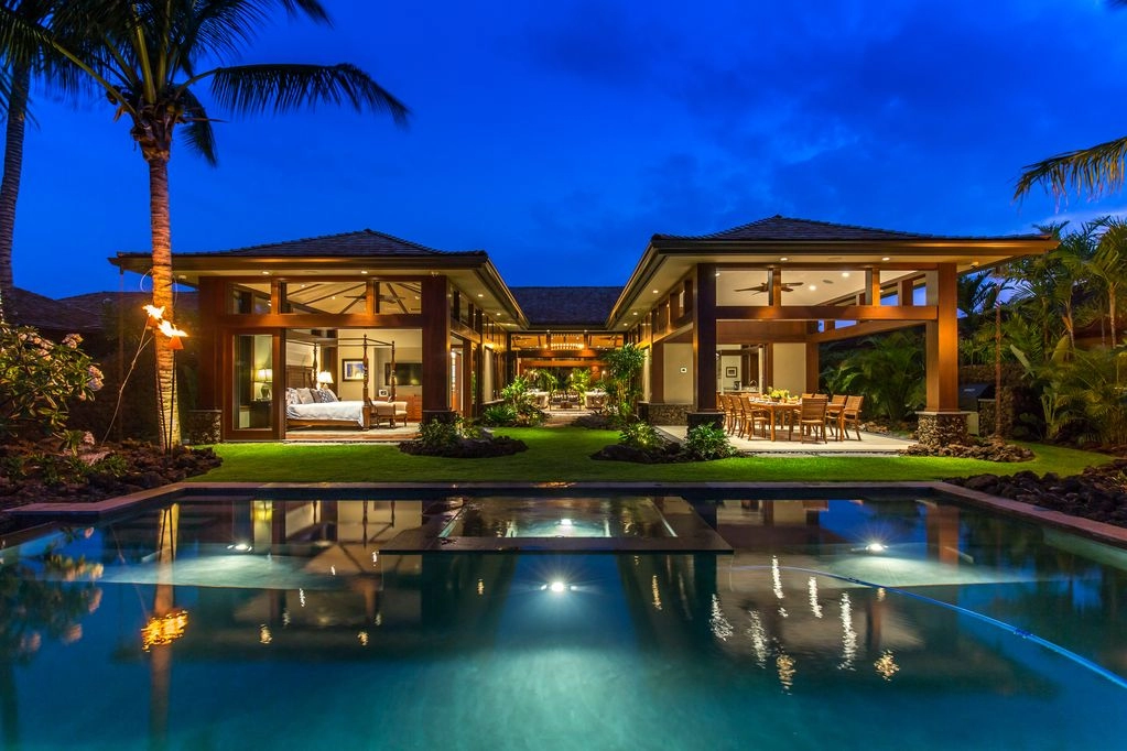 Hualalai 72-121 - Stunning Pool and back of home at dusk - Hawaii Vacation Home