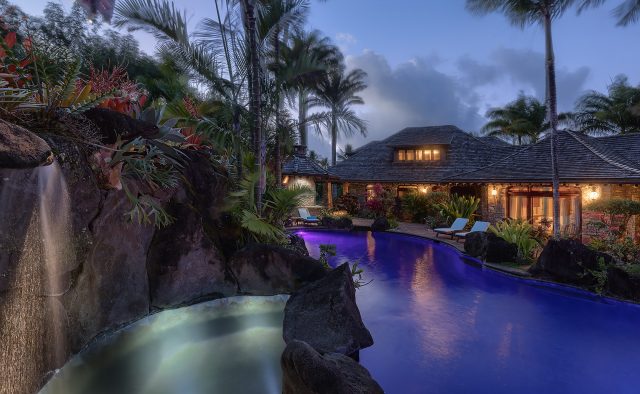 Enchanting Meadow - Pool with waterfall lit up - Hawaii Vacation Home