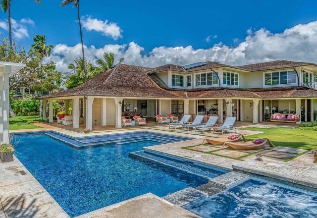 An image of the pool and back of the Coral Reef villa for rent